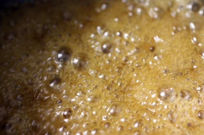 Caramel bubbling in a pot