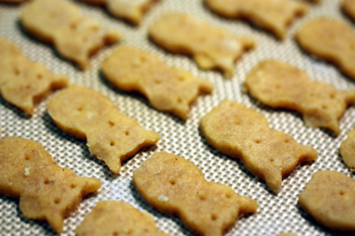 Owl Crackers with upside down faces about to head into the oven