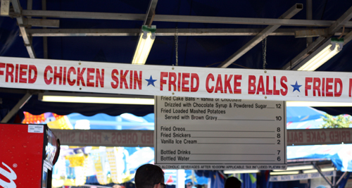 State Fair sign advertising Fried Chicken Skin, Fried Cake Balls and more