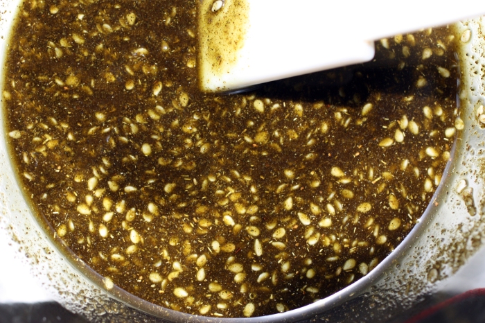 Bowl of zahatar spice and olive oil mixture