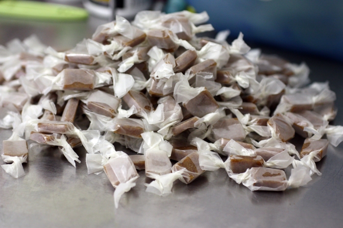Bacon caramels individually wrapped in wax paper